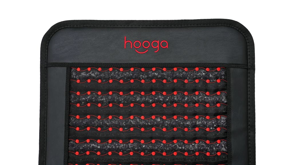 Detailed texture of Hooga PEMF mat showing tourmaline layer and coil pattern