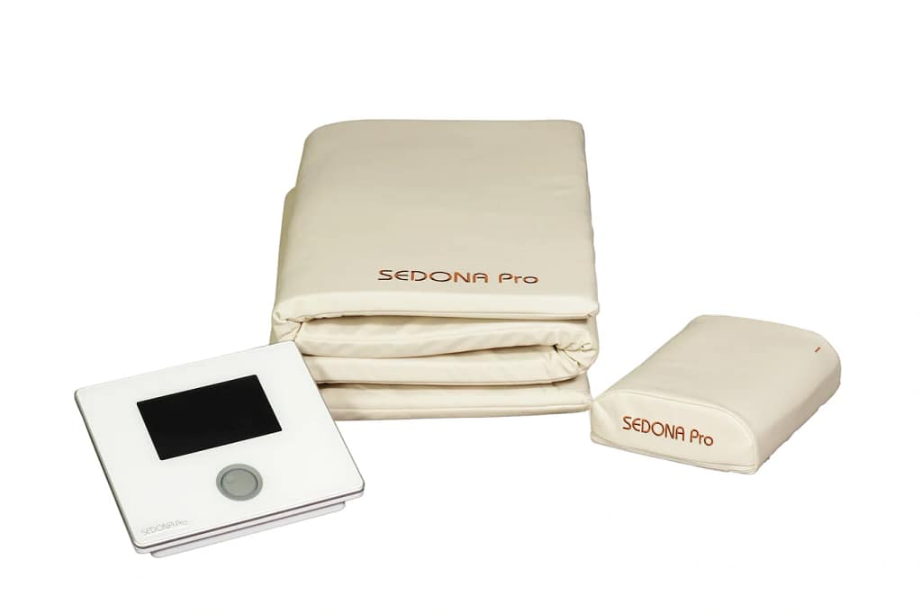 Beige Sedona Pro PEMF Mat folded with attached applicator