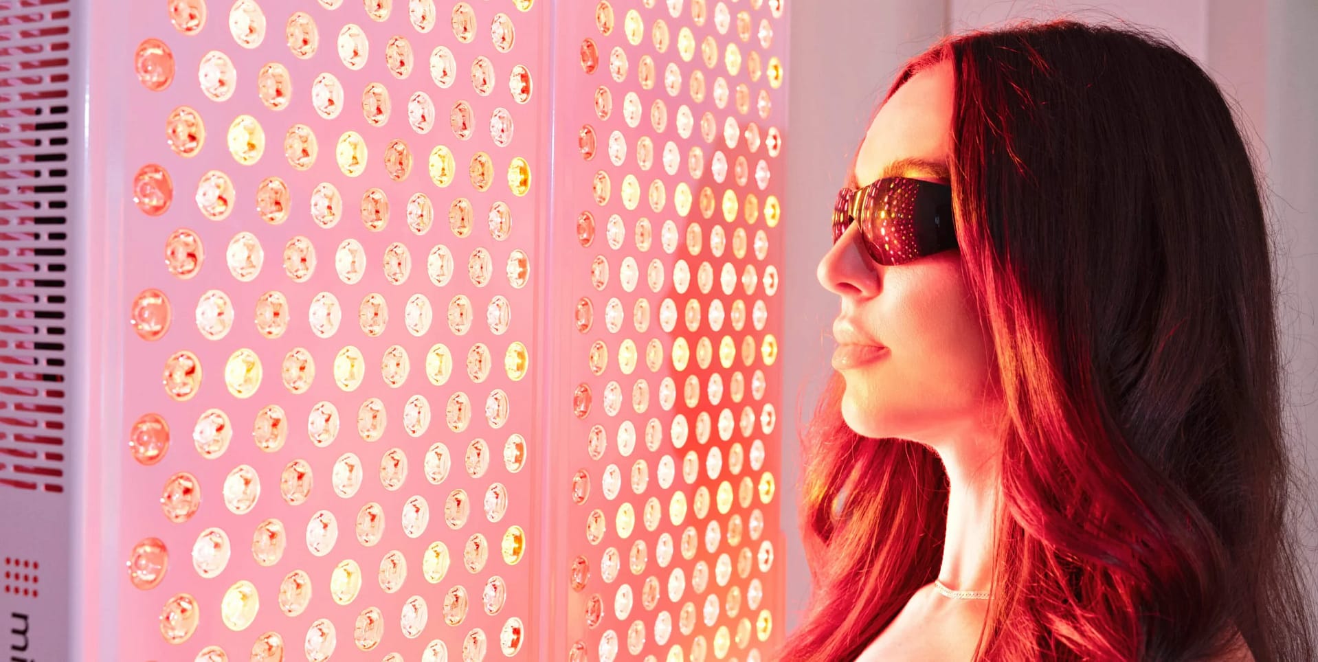 Closeup of a woman wearing protective glasses during a mito panel session with the Adapt 4.0
