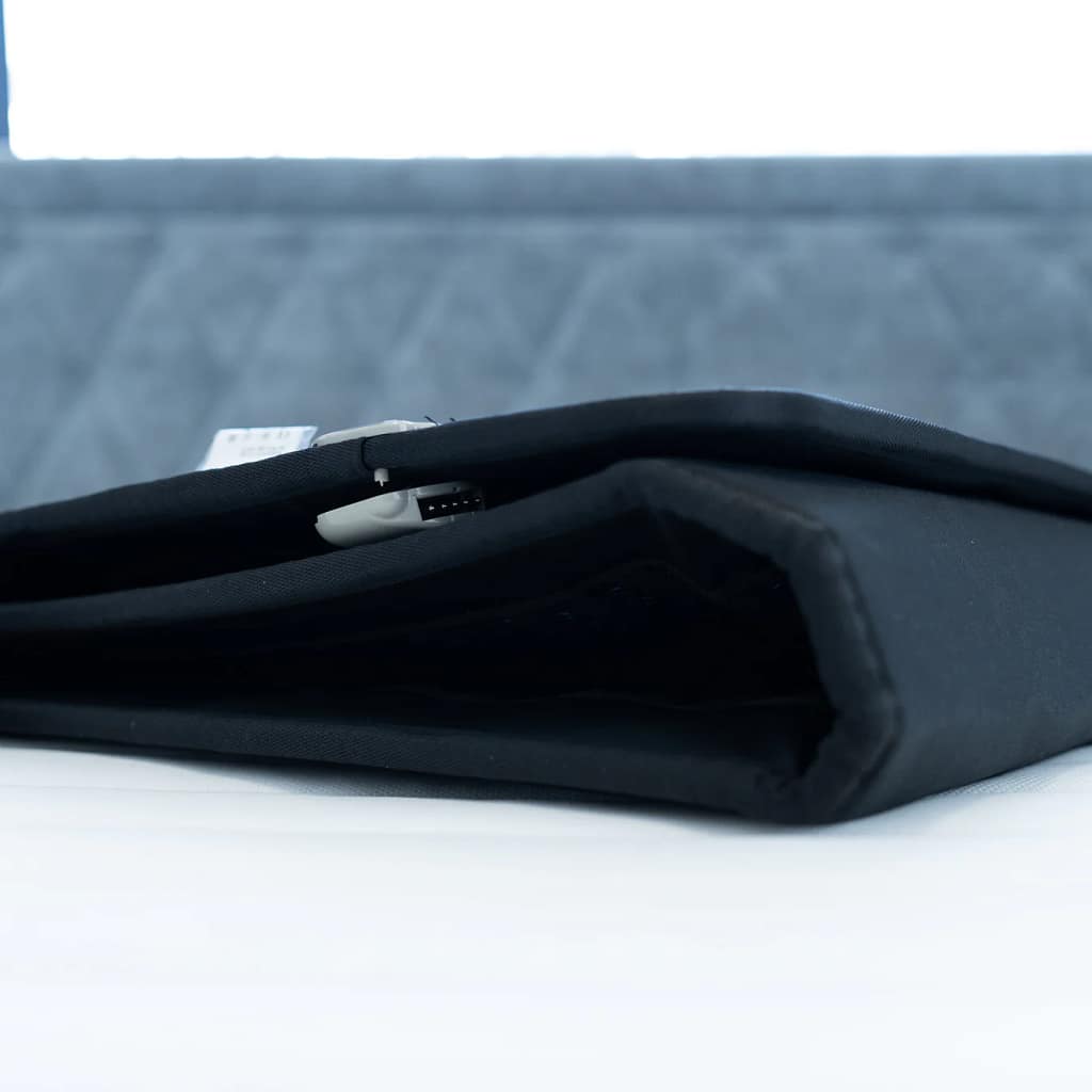 Grooni PEMF Mat Folded showing the plug for A/C connection