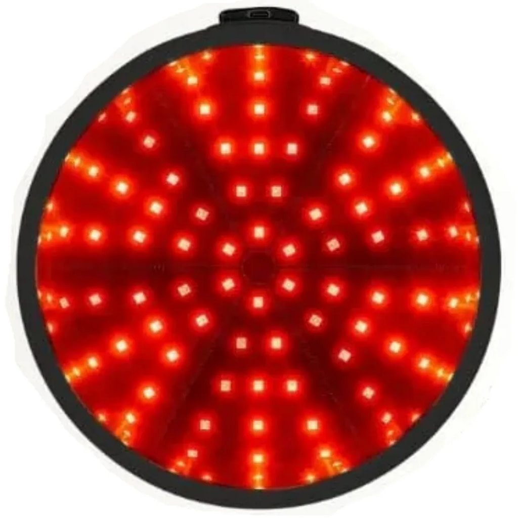 Interior of ApeBorn LED Hat displaying activated dual-wavelength red light array for scalp therapy