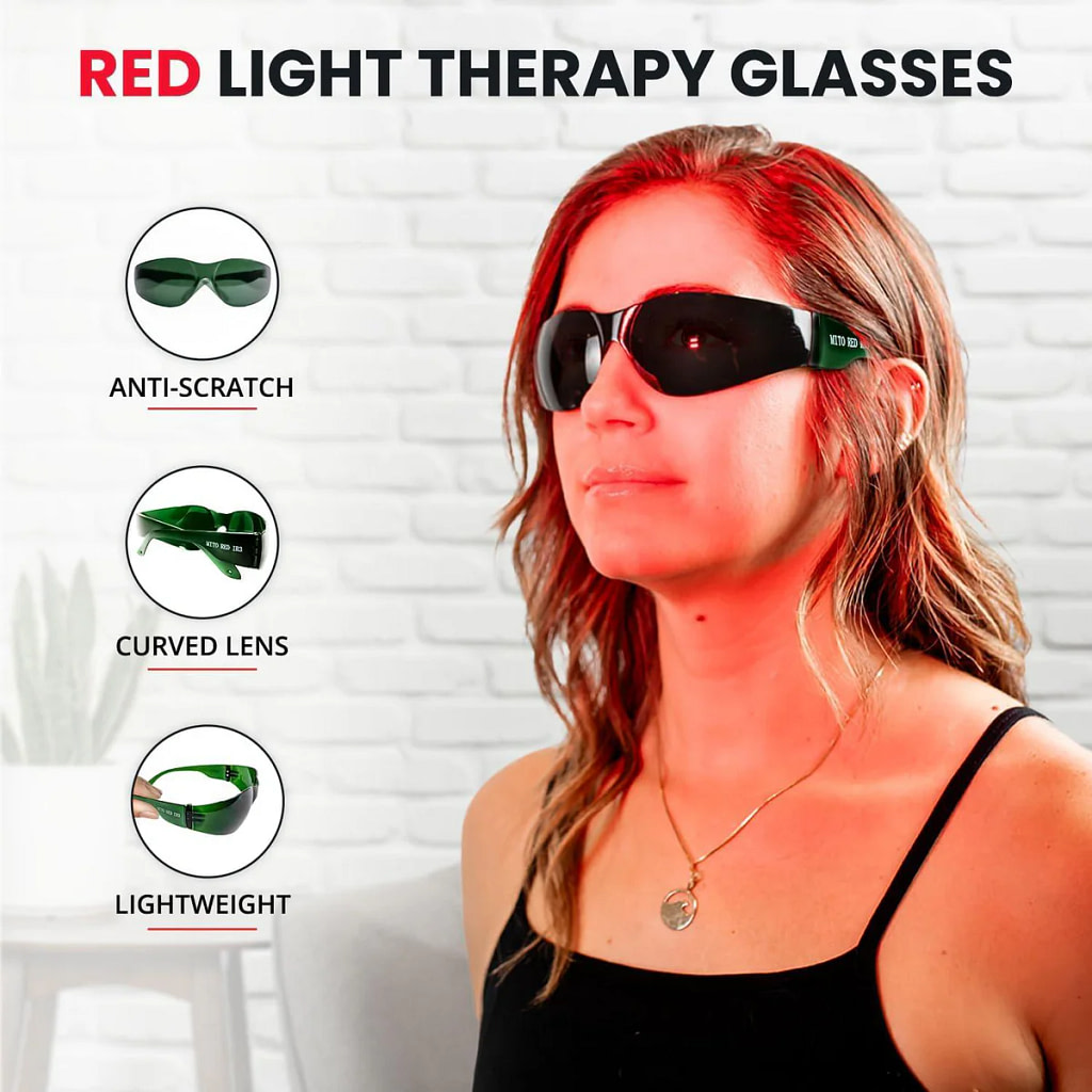 Woman wearing the Mito Red Light IR3 protection glasses during a mito red light panel session