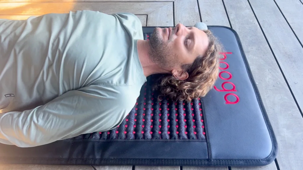 Close view of Marco on the Hooga PEMF Mat