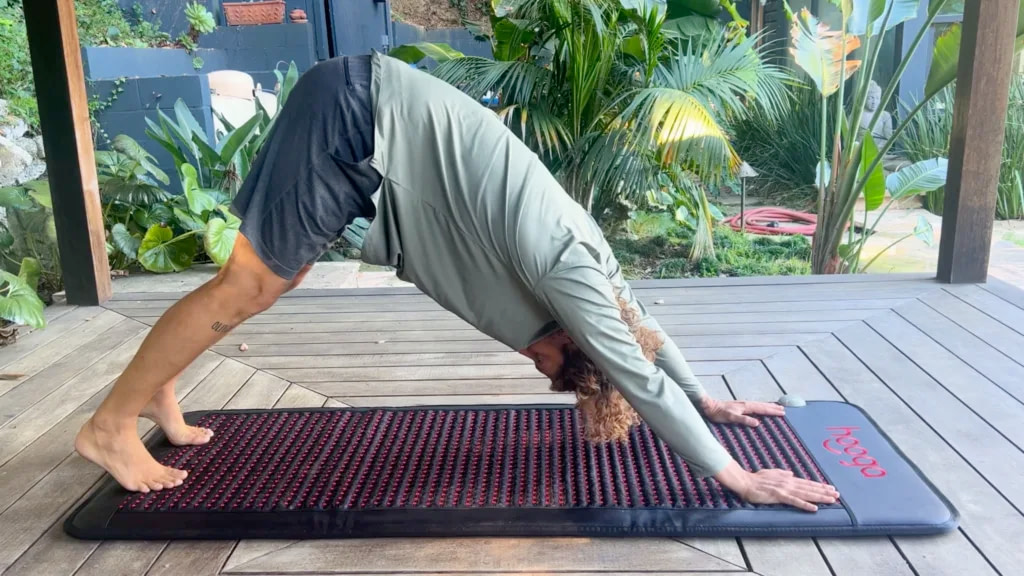 Marco doing yoga exercises on the Hooga Mat