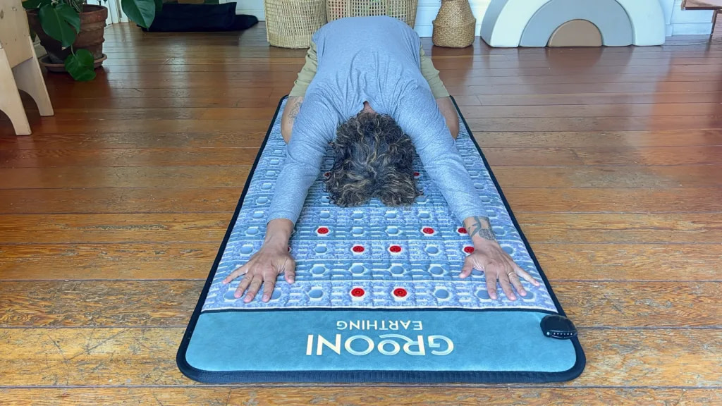 Marco doing yoga on the Grooni mat