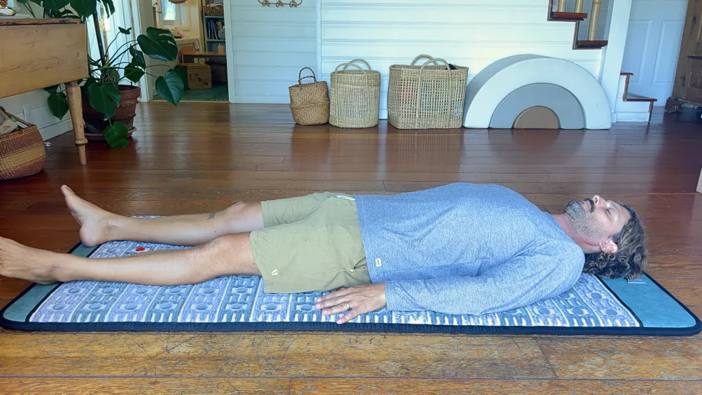 Marco relaxing on the Grooni PEMF mat