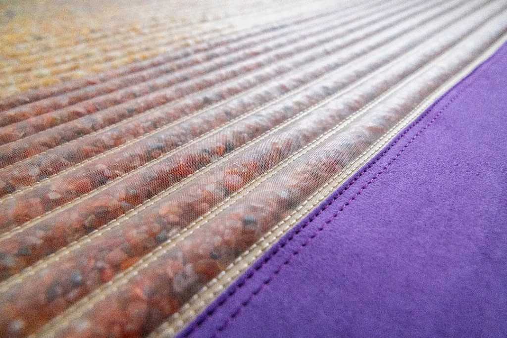 Golden jade and red jasper section of the PEMF mat for grounding and vitality