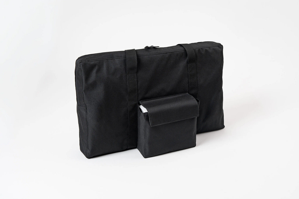 OmniPEMF NeoSurround mat packed in its carry bag with the device box