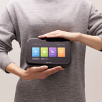 Man holding the bemer evo control unit