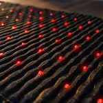 Closeup of the LEDs that deliver red light therapy on the JET mat