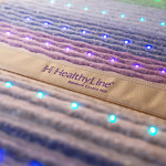 Detail on the Healthyline Rainbow Chakra, showing the texture and the brand logo
