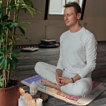 Man meditating on the Rainbow Charka minimat