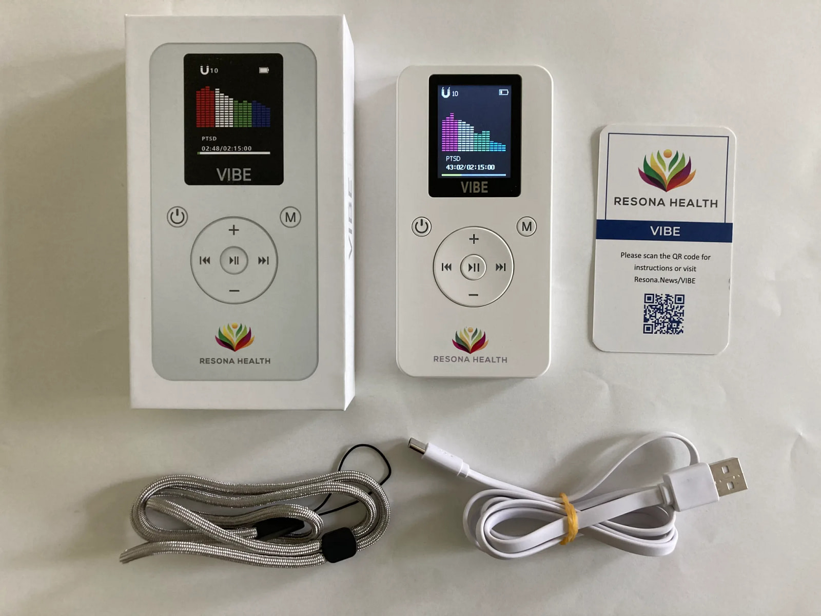 Resona Vibe Review kit with device, USB charger, lanyard, and product box