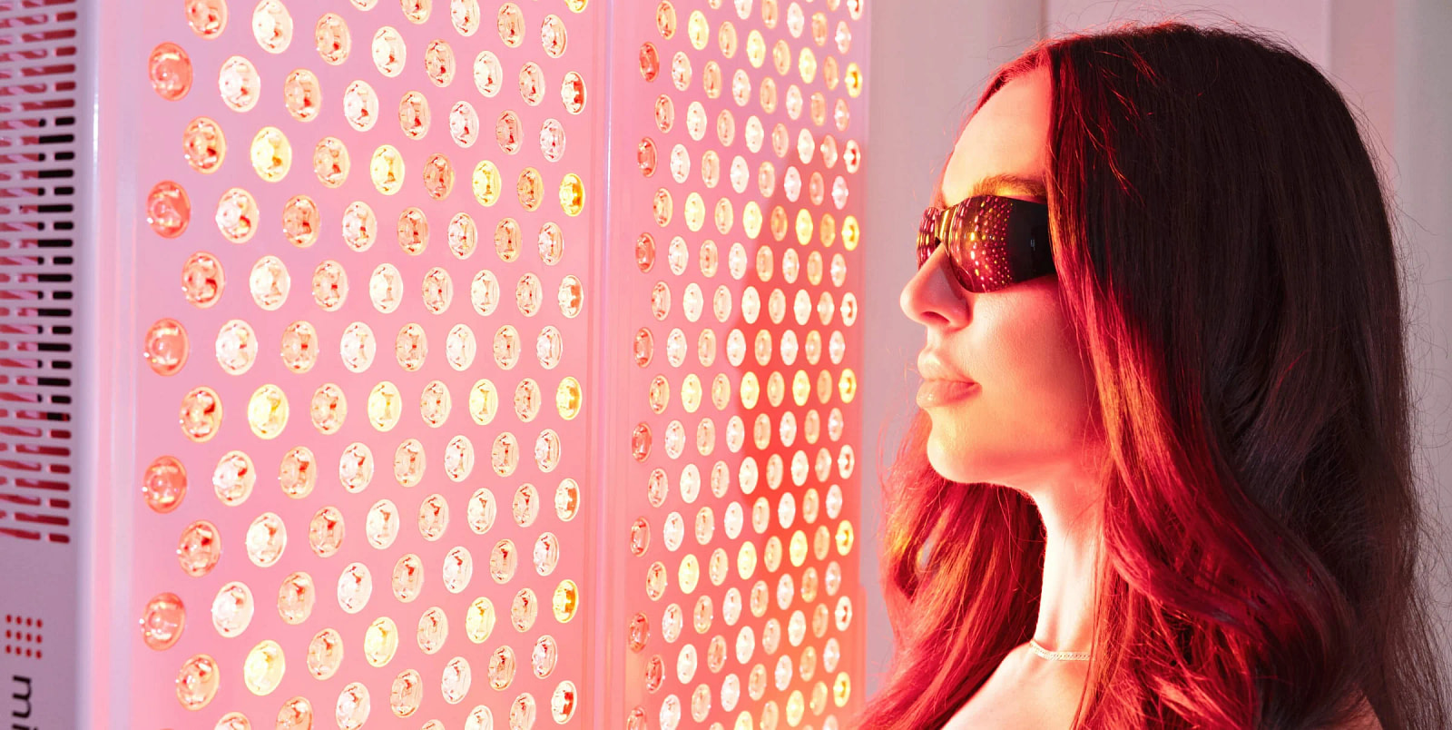 Closeup of a woman wearing protective glasses during a mito panel session with the Adapt 4.0