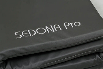 Folded grey Sedona Pro PEMF Mat ready for storage or transport