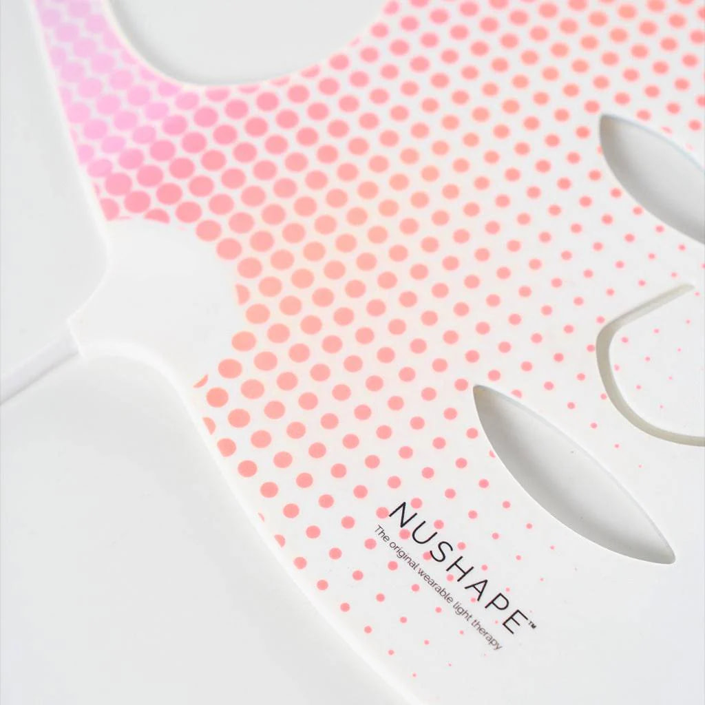 Front panel detail of Nushape Red Light Therapy Mask showing LED light array design