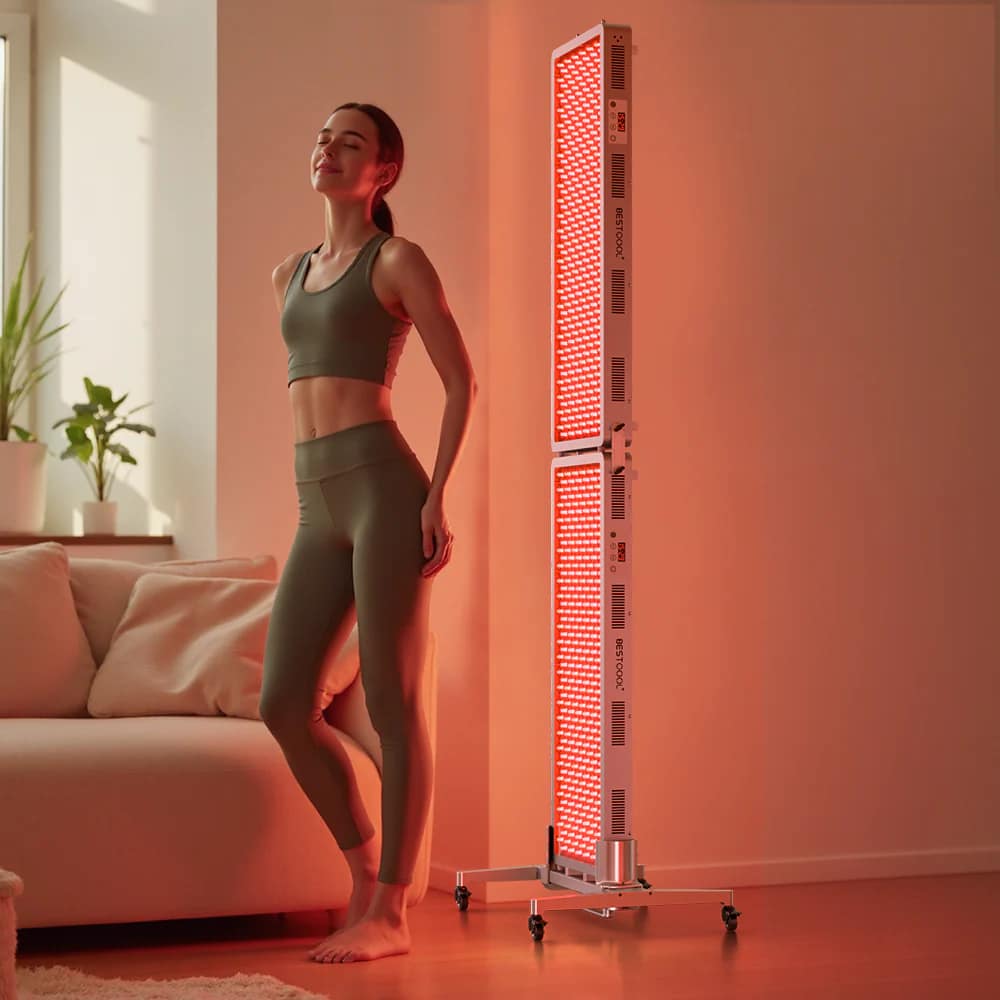 Woman receiving full-body red light therapy treatment from BestQool PRO 300 panel for back pain relief