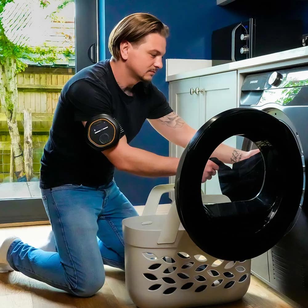 Celler8 PEMF therapy in use during daily chores for joint relief