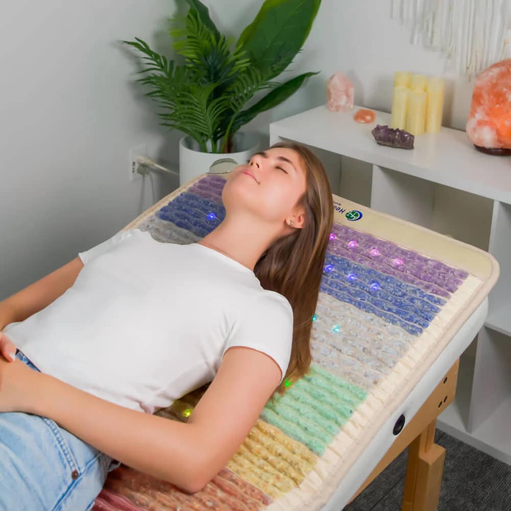 Relaxation session with the HealthyLine PEMF mat on a massage table