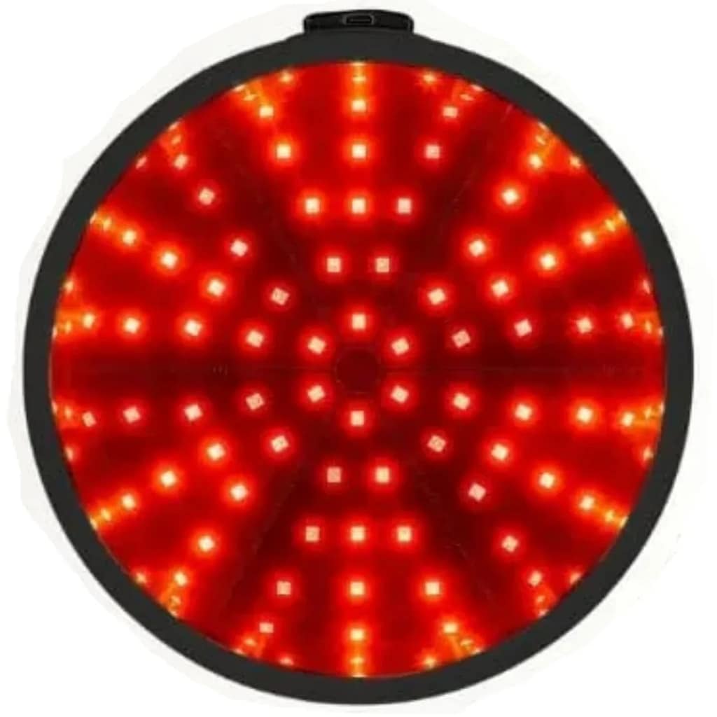 Interior of ApeBorn LED Hat displaying activated dual-wavelength red light array for scalp therapy