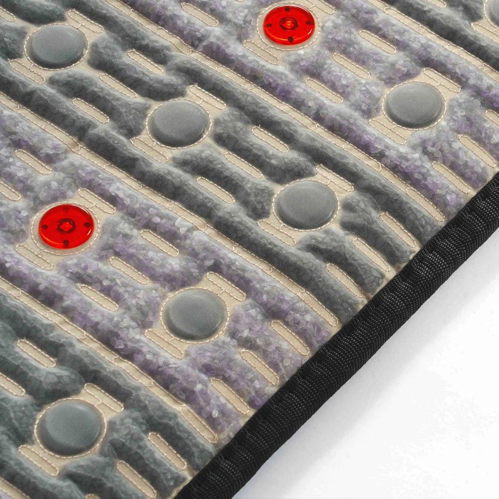 Side view detail of Grooni PEMF Mat showing craftsmanship and materials