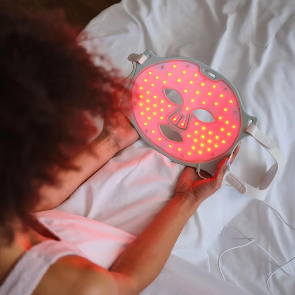 Kala Red Light Therapy Mask interior view displaying activated LED light array