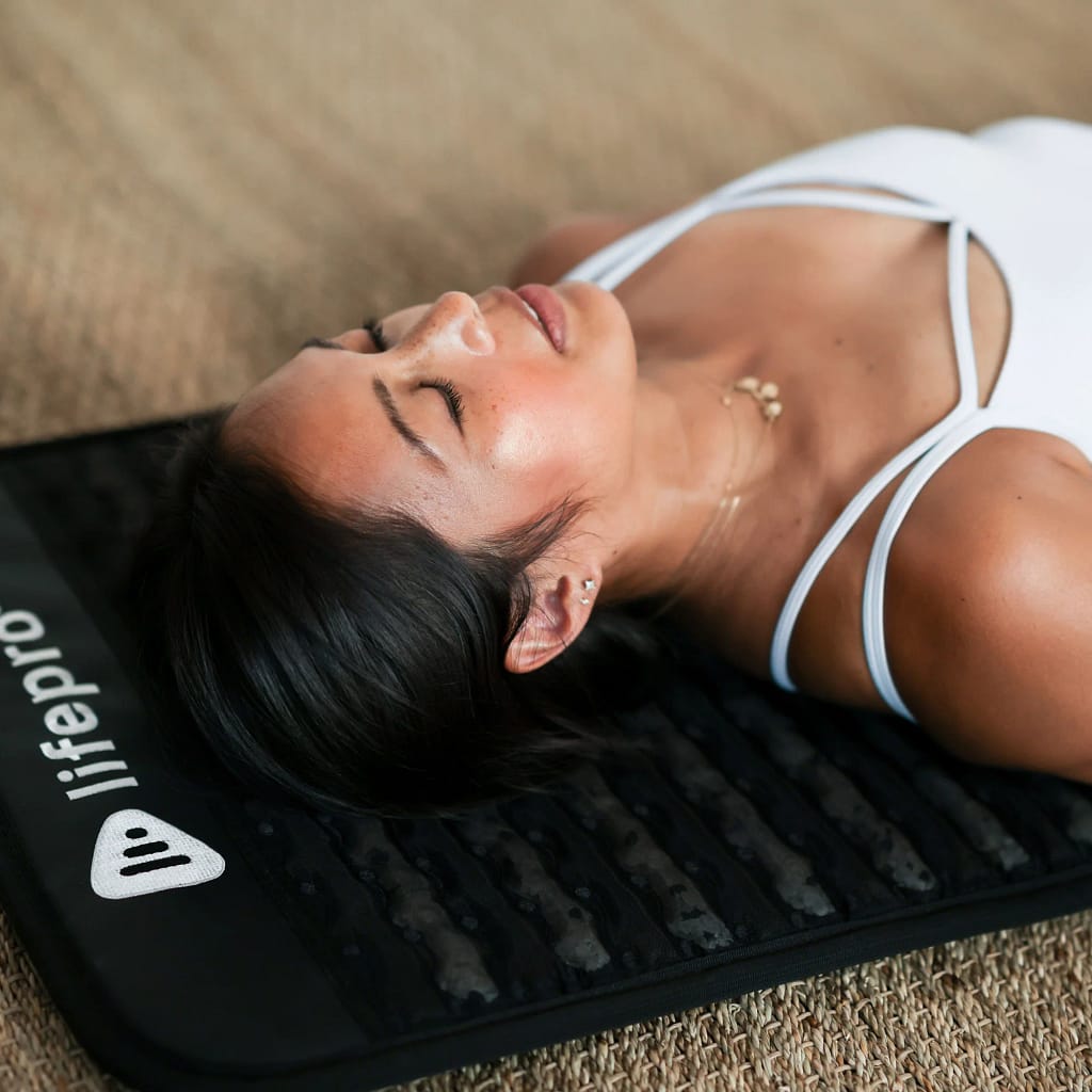 Woman Lying On InfraZen PEMF MiniMat For Stress Relief