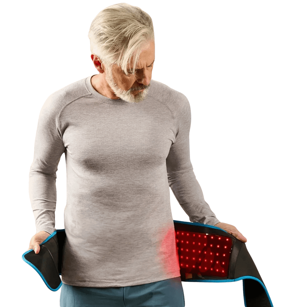 Man positioning LifePro AllevaRed around hips for lower back and joint pain relief treatment