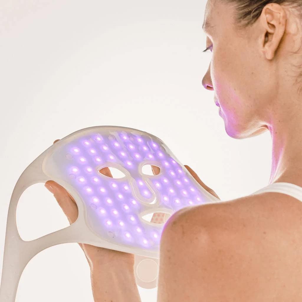 Nushape LED Face Mask activated in blue light mode for acne and blemish treatment