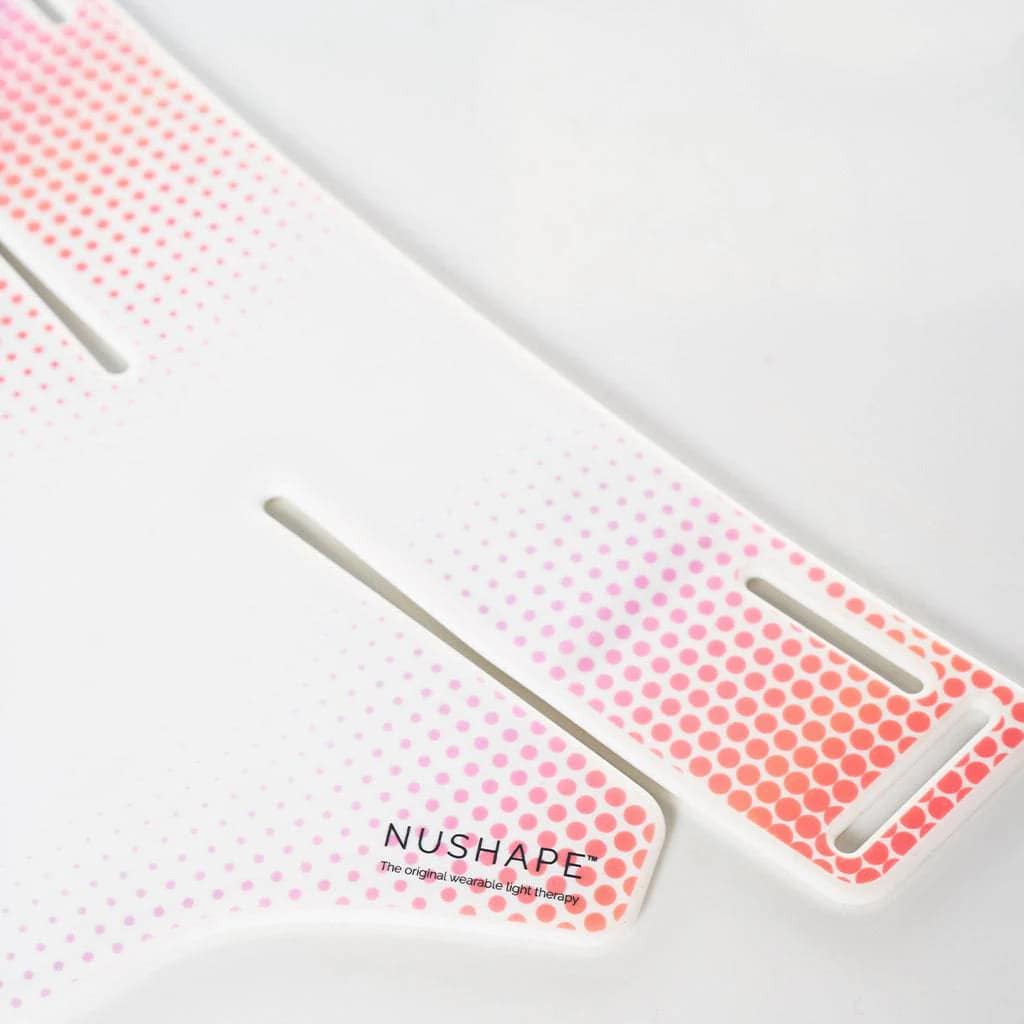 Close-up of Nushape LED Neck Piece adjustable strap system and attachment mechanism