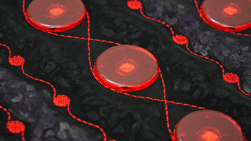 detailed exterior of Hooga PEMF belt with gemstone infusion