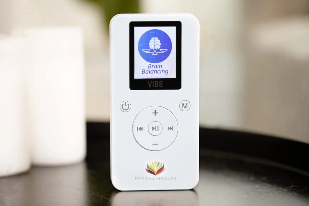 Resona Vibe PEMF device resting on a table, ready for daily use