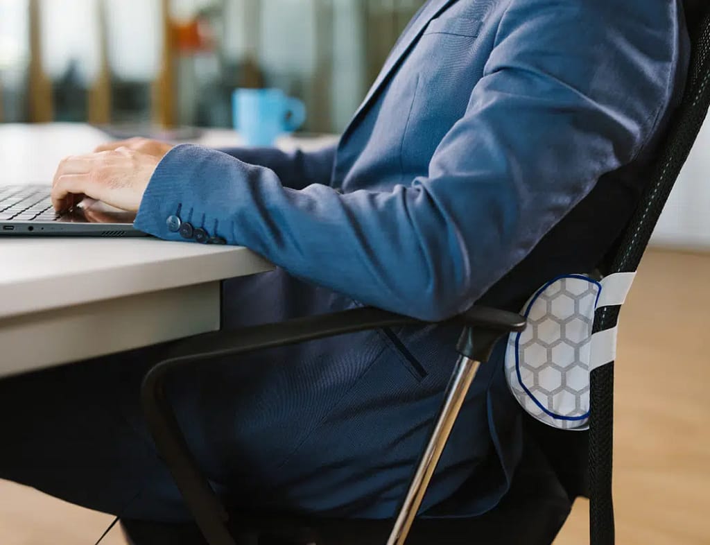 NeoRhythm Tube - portable PEMF tube pillow used for lumbar support