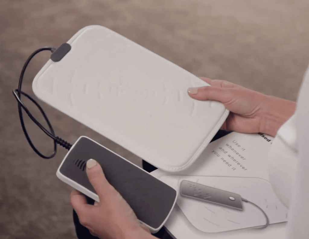 OMI PulsePad lightweight PEMF device with compact controller for on-the-go therapy