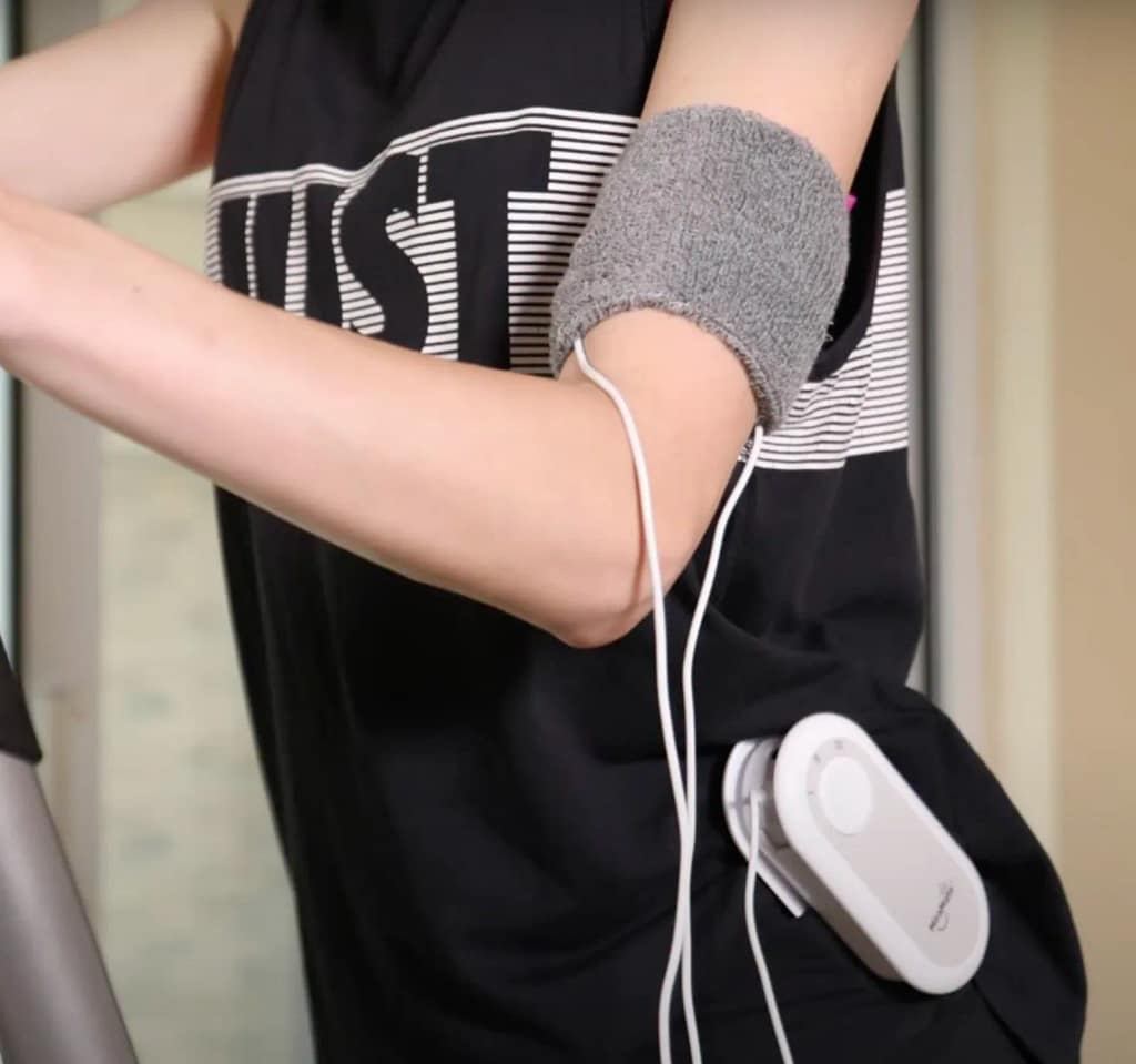 MiraMate Mini Magic in Use During Exercise – PEMF Straps on Hip and Arm