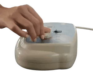 PEMF device remote control showing intensity levels and timer settings