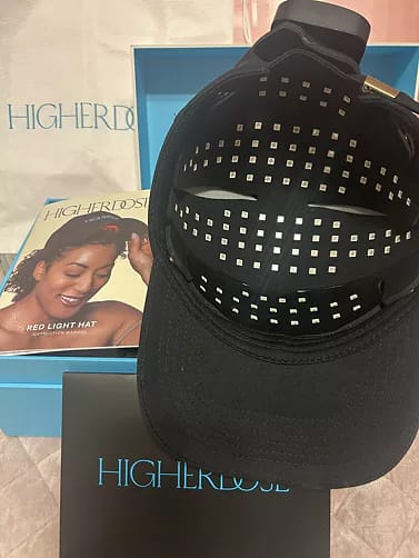 HigherDose Red Light Hat inner panel showing LED placement and battery-powered technology when inactive