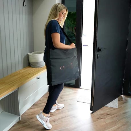 Travel-ready PEMF mat in carry bag for use at work, gym, or wellness retreats