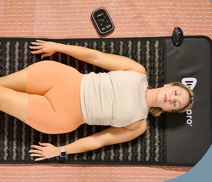 Top View Of LifePro Infrazen PEMF Mat With Woman Receiving PEMF Therapy