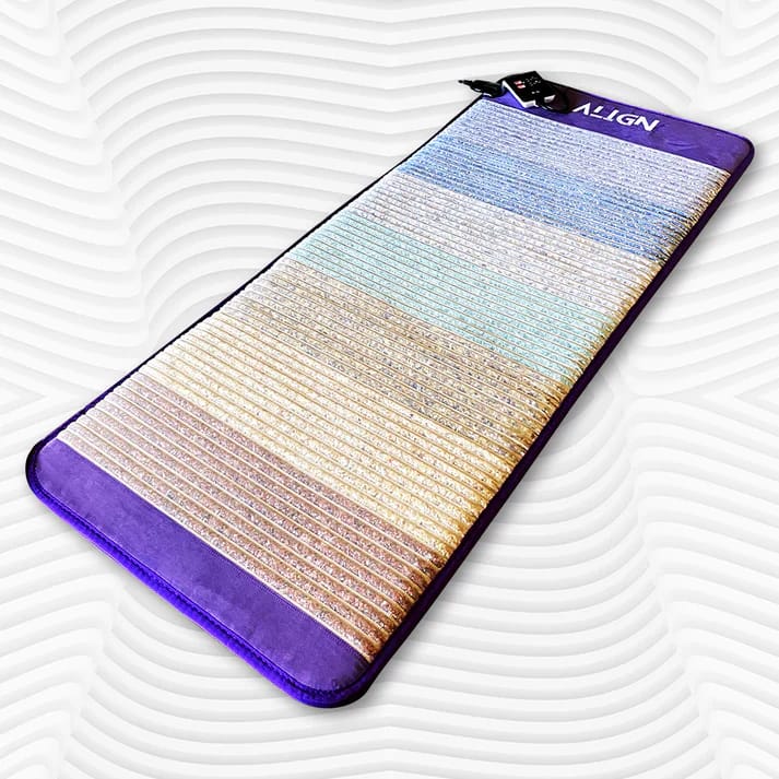 Angled overhead view of the PEMF mat showing full crystal and coil layout