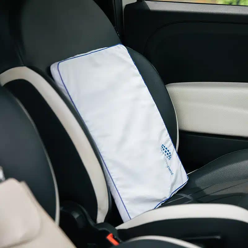 OmniPEMF NeoRhythm Pad: portable PEMF therapy pad on car seat – ideal for travel