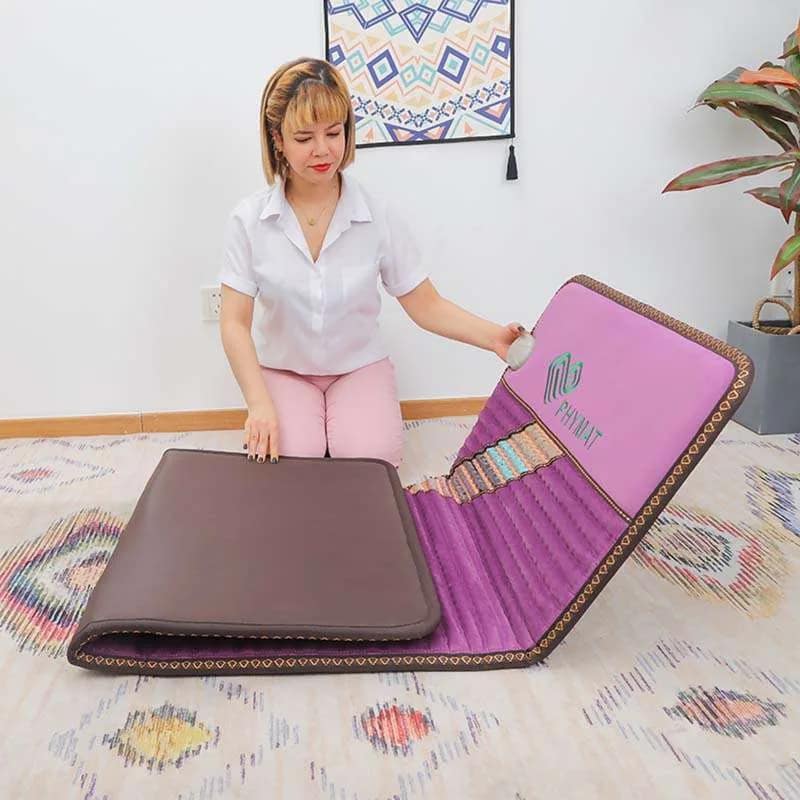 Folding the Phymat Amethyst PEMF Mat for easy storage and portability