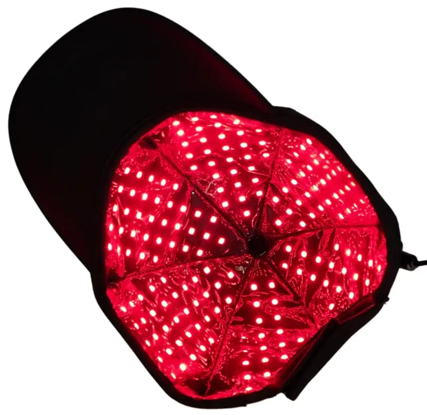 Interior of Therasage LED Hat displaying illuminated red light panel for hair growth therapy