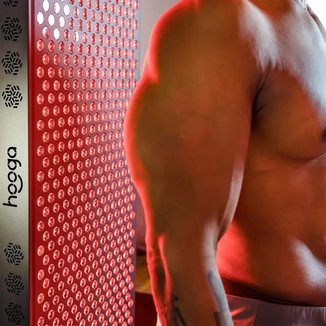 Man receiving light from Hooga 4500 panel on his back