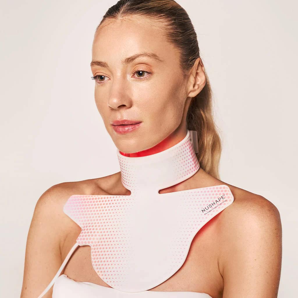 Woman wearing the Nushape Red Light Therapy Neck