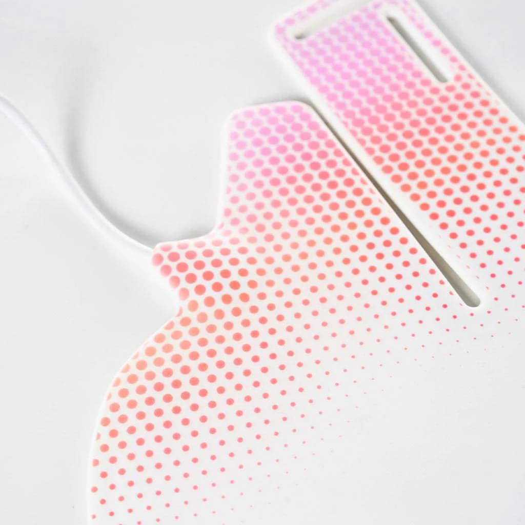 Detail view of Nushape Red Light Neck Device controller cable connection and charging port