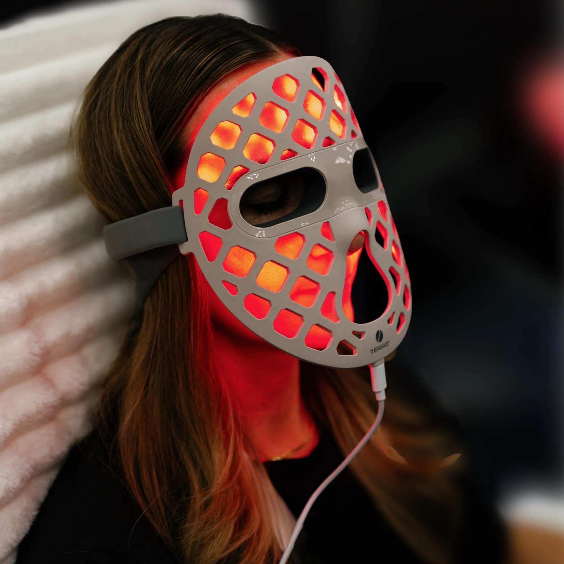 At-home skincare routine using Therasage Mask2Go+ red light therapy for skin rejuvenation